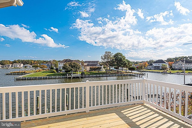 deck featuring a water view