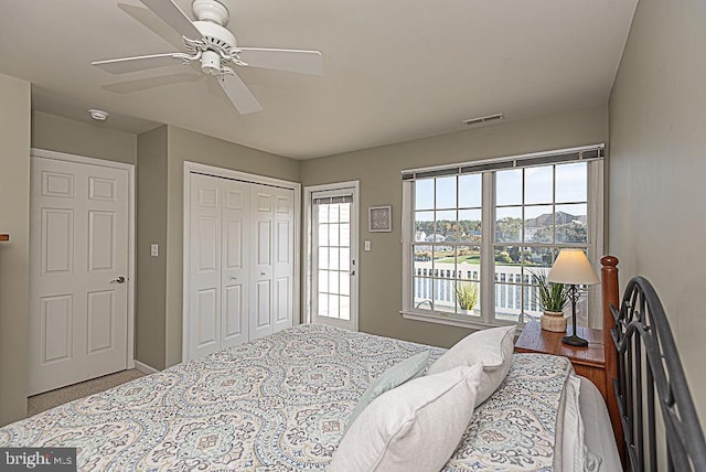 bedroom featuring a closet and ceiling fan