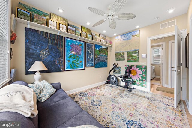 interior space featuring ceiling fan