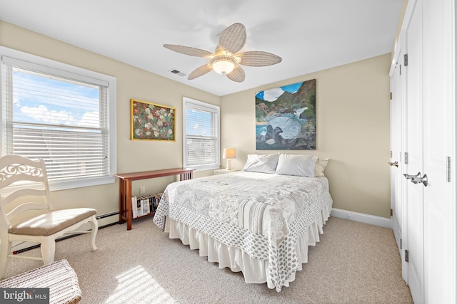 bedroom featuring ceiling fan, a closet, and light colored carpet