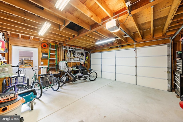 garage featuring a garage door opener