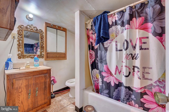 full bathroom with tile patterned floors, shower / bathtub combination with curtain, vanity, and toilet