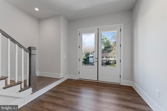 entrance foyer with dark wood-type flooring