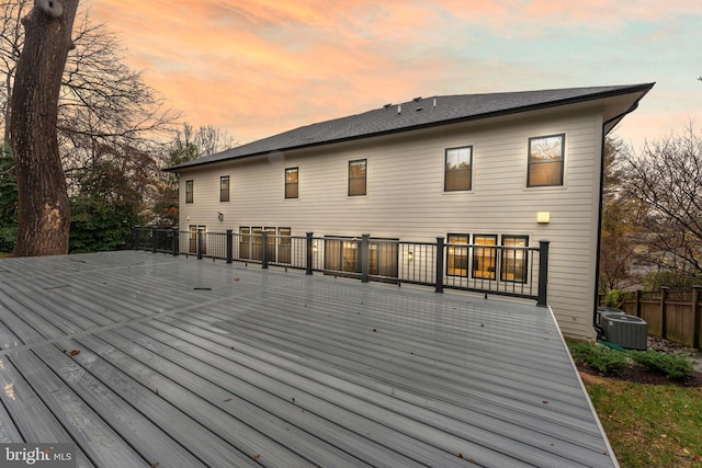 deck at dusk with central AC