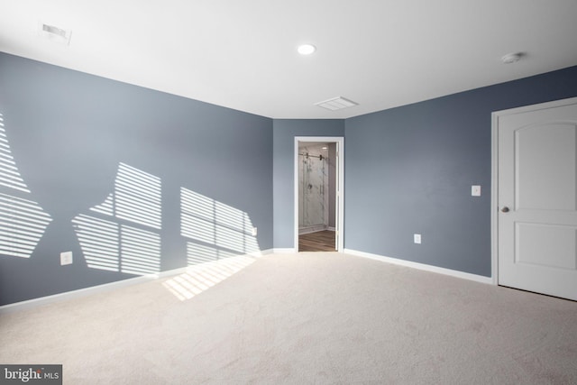 empty room featuring carpet