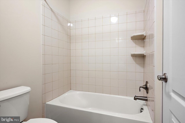 bathroom with toilet and shower / washtub combination