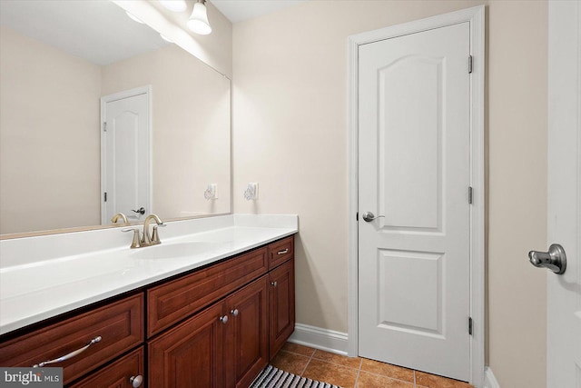 bathroom featuring tile patterned floors and vanity