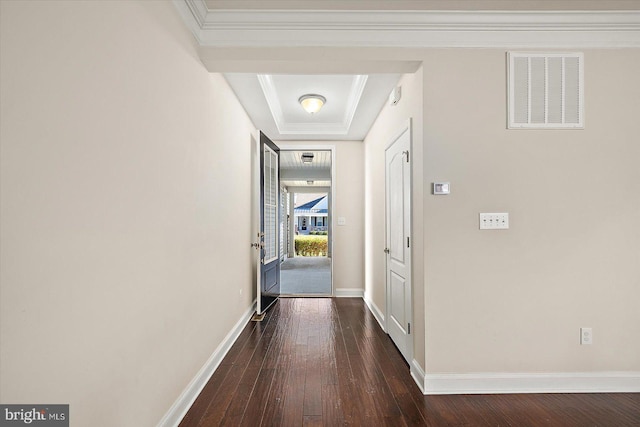 hall featuring dark hardwood / wood-style flooring and ornamental molding