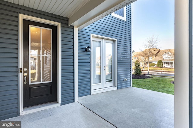 entrance to property featuring french doors