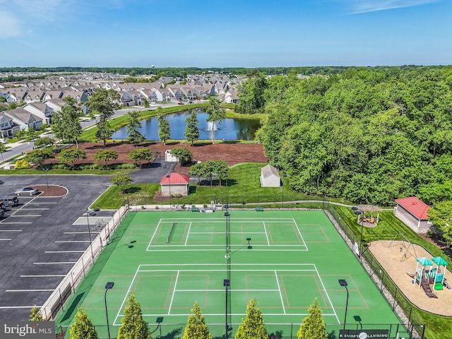 birds eye view of property featuring a water view