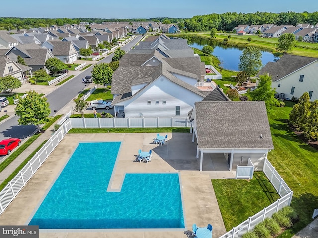 bird's eye view with a water view