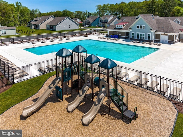 view of swimming pool with a patio