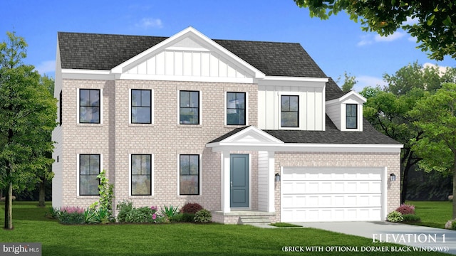 view of front of home with a garage and a front yard