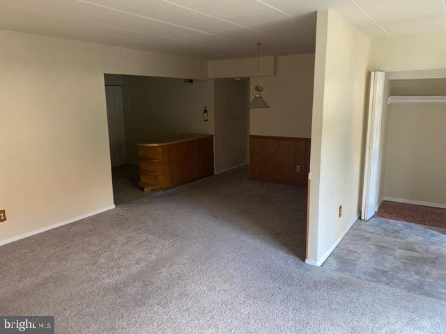 spare room with light colored carpet