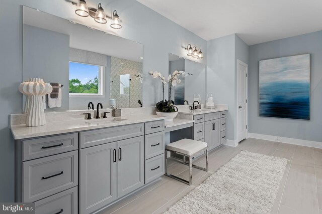 bathroom with vanity and a shower with shower door