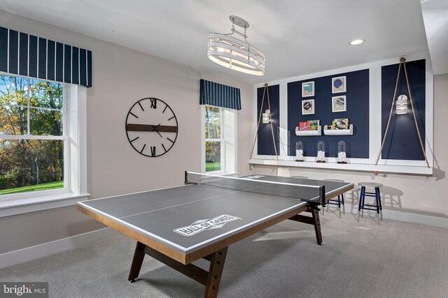 game room with carpet floors and a healthy amount of sunlight