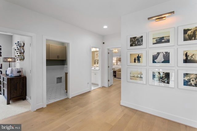 hallway featuring light hardwood / wood-style floors