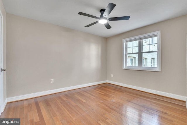 unfurnished room with light hardwood / wood-style flooring and ceiling fan