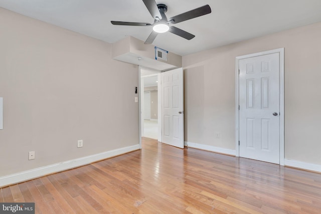 unfurnished bedroom with light hardwood / wood-style floors and ceiling fan