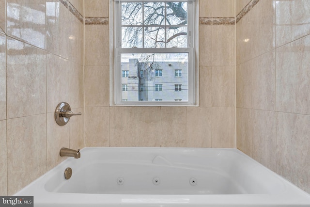 bathroom with a washtub