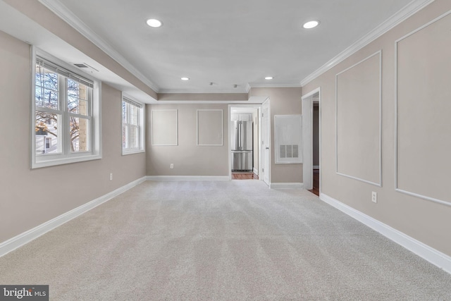 unfurnished bedroom featuring stainless steel fridge, light colored carpet, and ornamental molding