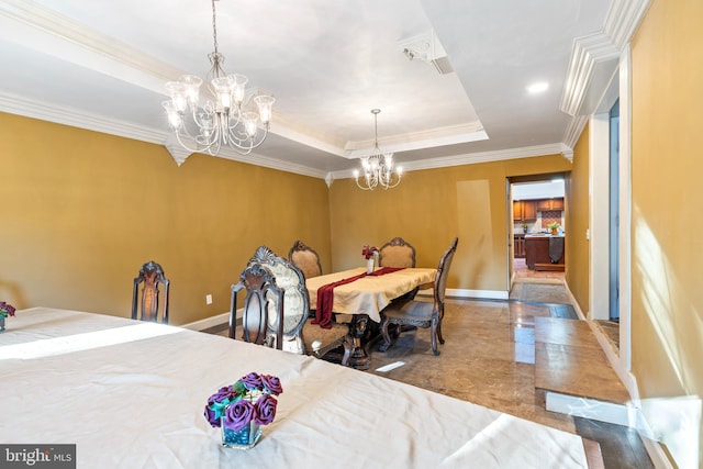 bedroom with a raised ceiling, an inviting chandelier, and crown molding