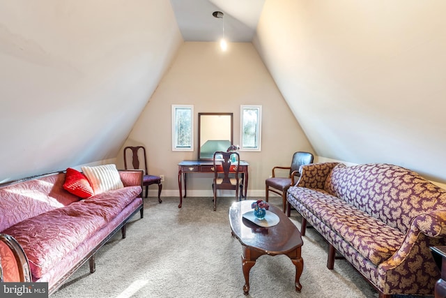 living room with light colored carpet and vaulted ceiling