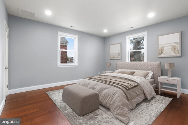 bedroom featuring dark wood-type flooring