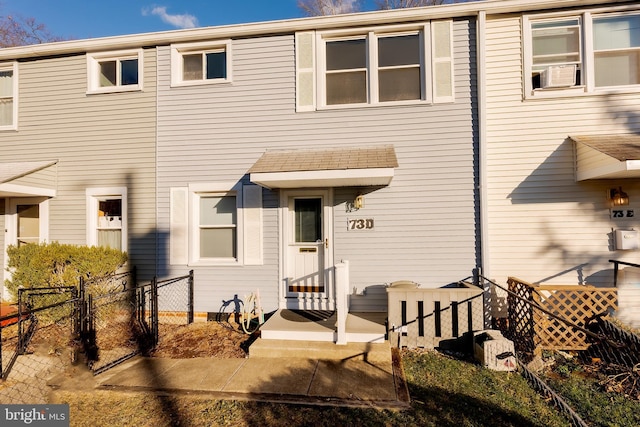 view of front of property with cooling unit