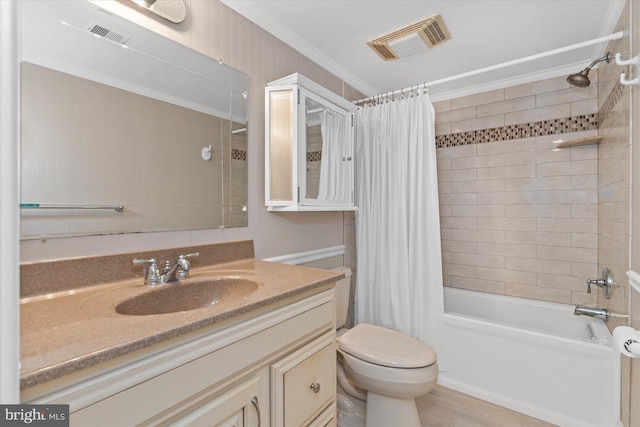 full bathroom with vanity, toilet, crown molding, and shower / tub combo