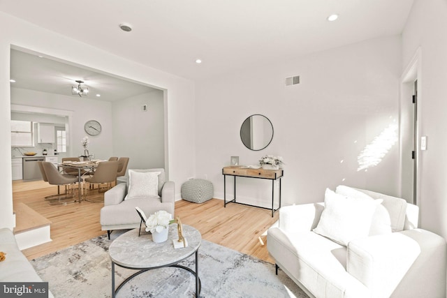 living room with light hardwood / wood-style flooring