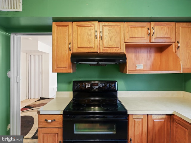 kitchen featuring black electric range oven