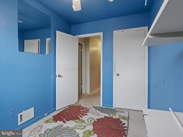 unfurnished bedroom with ceiling fan