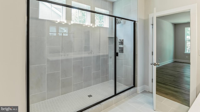 bathroom featuring tile patterned floors and walk in shower