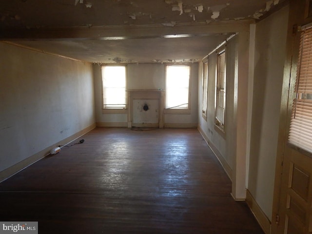 empty room with hardwood / wood-style floors