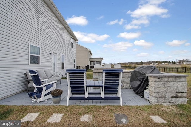 view of patio / terrace featuring a wooden deck