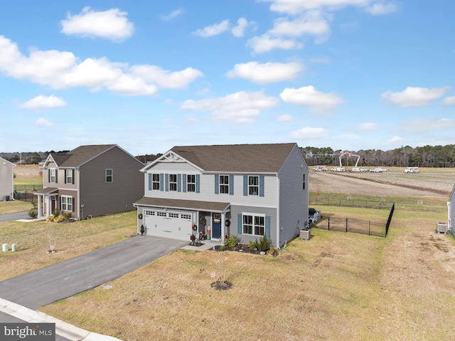 view of front facade featuring a garage and a front lawn