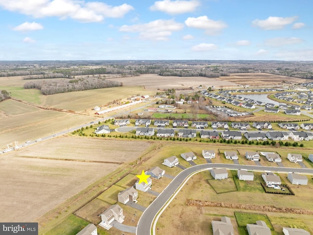 birds eye view of property featuring a rural view