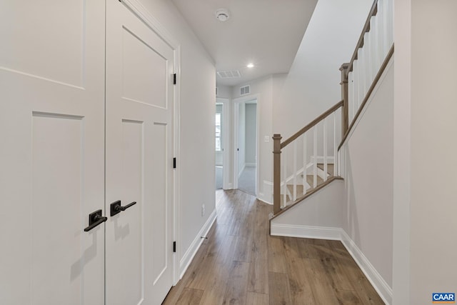 hallway with light wood-type flooring