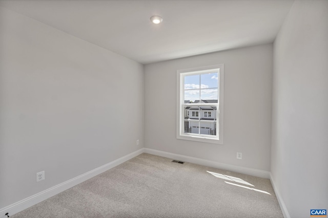 view of carpeted spare room