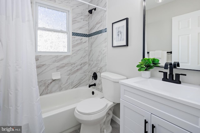 full bathroom featuring shower / tub combo with curtain, vanity, and toilet