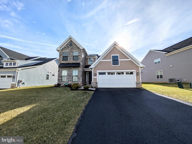 view of front of house featuring central AC and a front yard