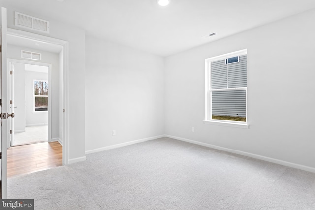 view of carpeted spare room