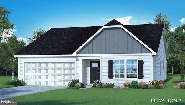 view of front of house with a front yard and a garage