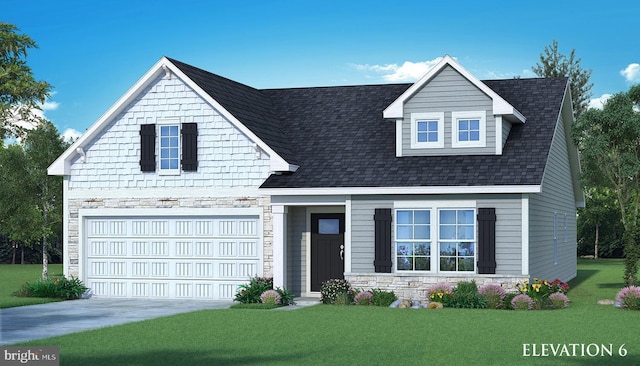 view of front of home featuring a front yard and a garage