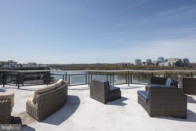 view of patio / terrace with a water view