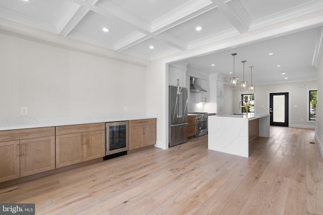 3710 S St NW, Washington, DC 20007 - kitchen featuring premium appliances, beverage cooler, light wood finished floors, wall chimney exhaust hood, and recessed lighting