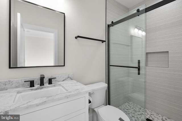 3710 S St NW, Washington, DC 20007 - bathroom featuring toilet, vanity, and a stall shower