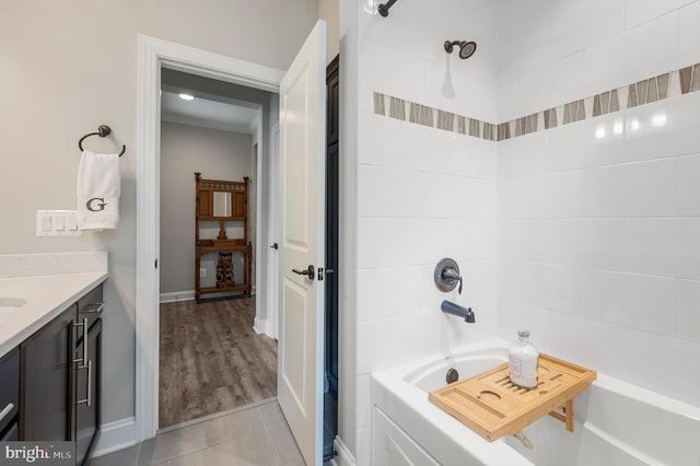 bathroom featuring vanity and bathing tub / shower combination