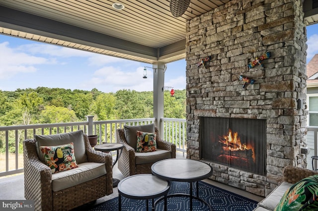 exterior space featuring an outdoor stone fireplace